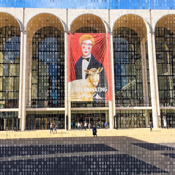 Exterior view of the Metropolitan Opera House from Lincoln Center Plaza, New York, New York, October 22, 2017. A large banner advertises the premiere of