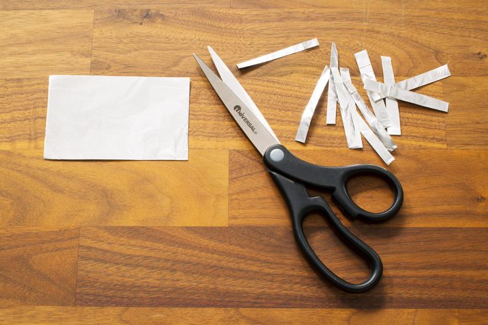sharpening scissors with strips of foil