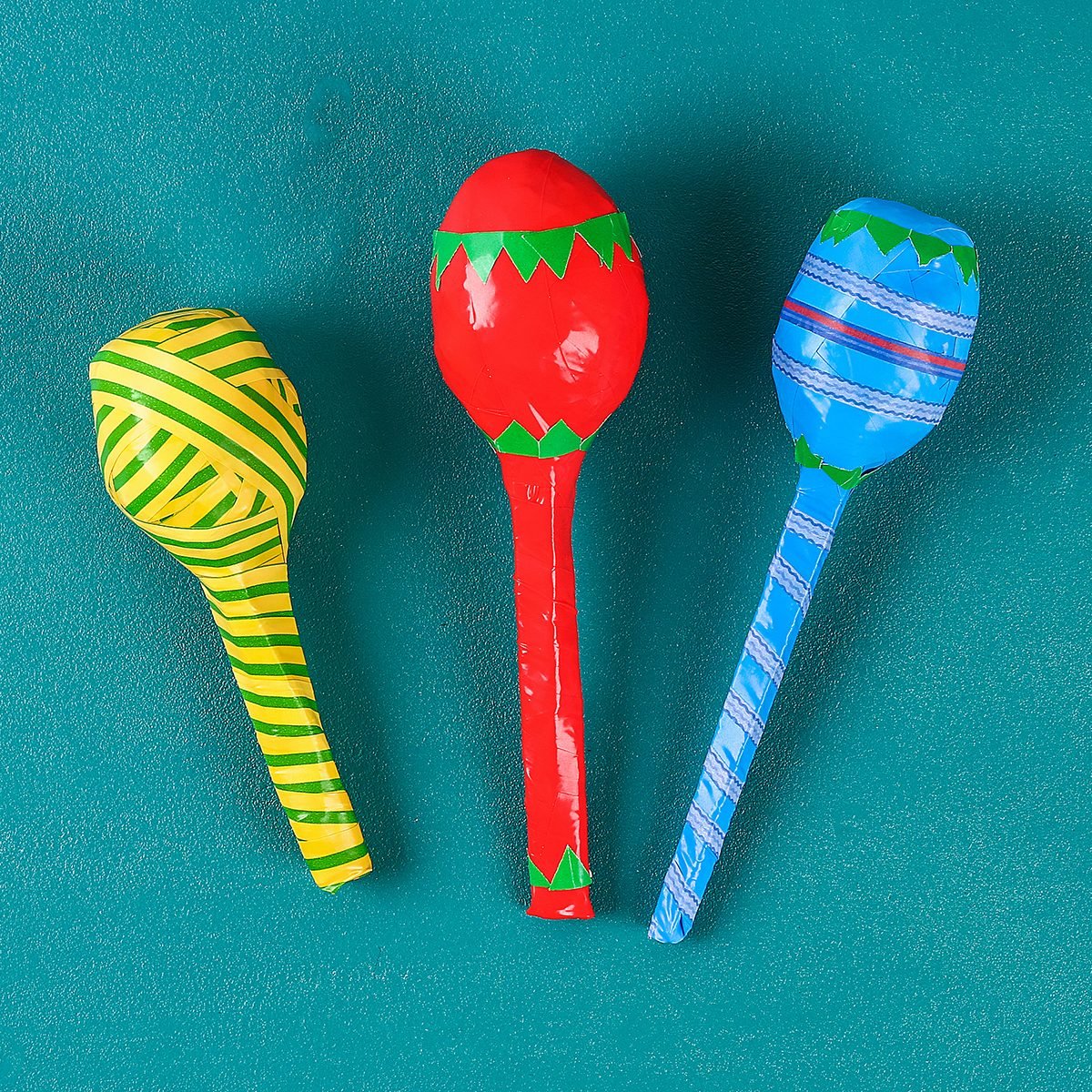 Diy cinco de mayo maracas from eggs, spoons and cereals on a green background. Gift idea, decor cinco de mayo. Step by step. Top view. Process kid children craft.