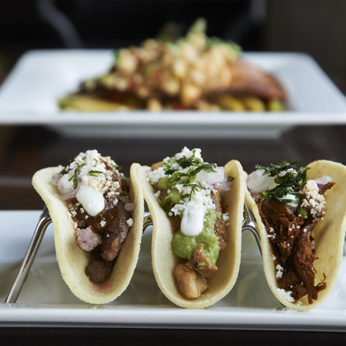 Three tacos on a plate