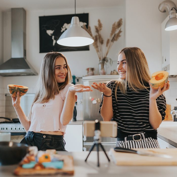 SCROLL, COOK, REPEAT Food Trends Report, Photo series of two female teenage vegan vloggers filming a show about cooking vegan foods.
