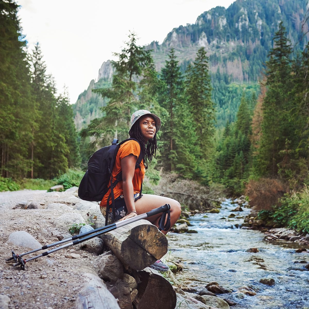 Shot of a young attractive woman hiking in nature