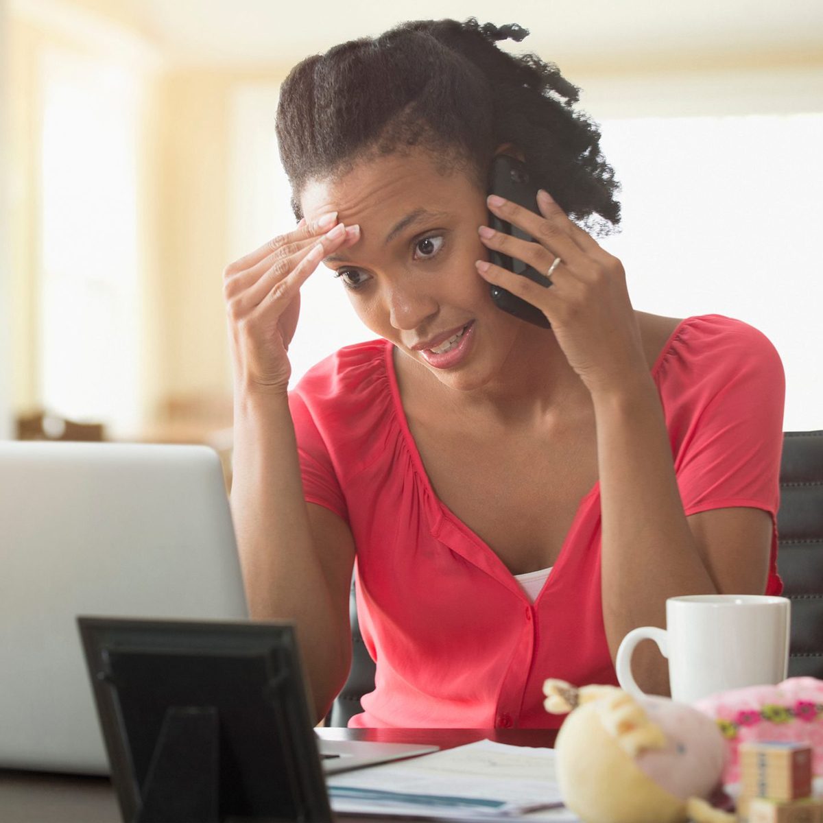 Black woman talking on cell phone