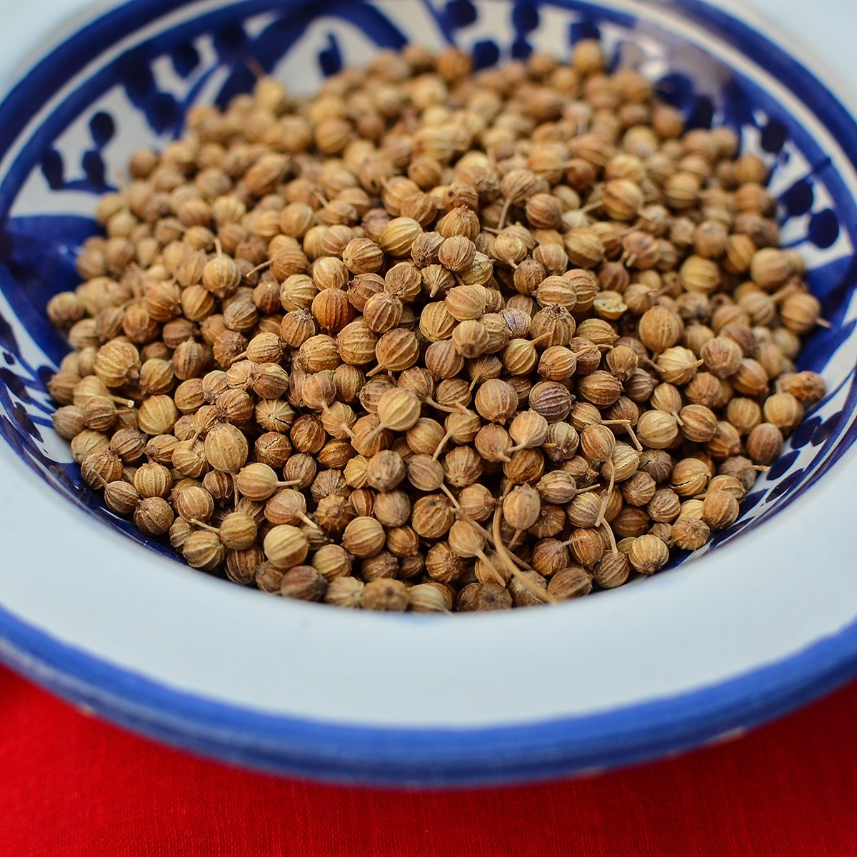 indian spices A bowls of coriander seeds acts as a centrepiece