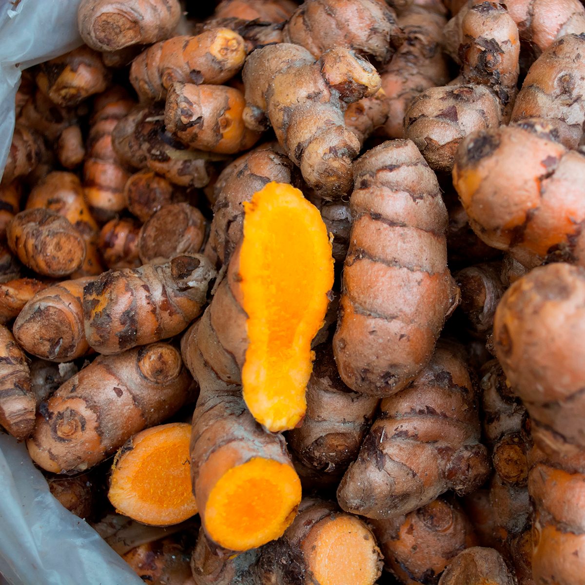 indian spices Fresh Turmeric For Sale At Market.india. (Photo by: Madhurima Sil/IndiaPictures/Universal Images Group via Getty Images)
