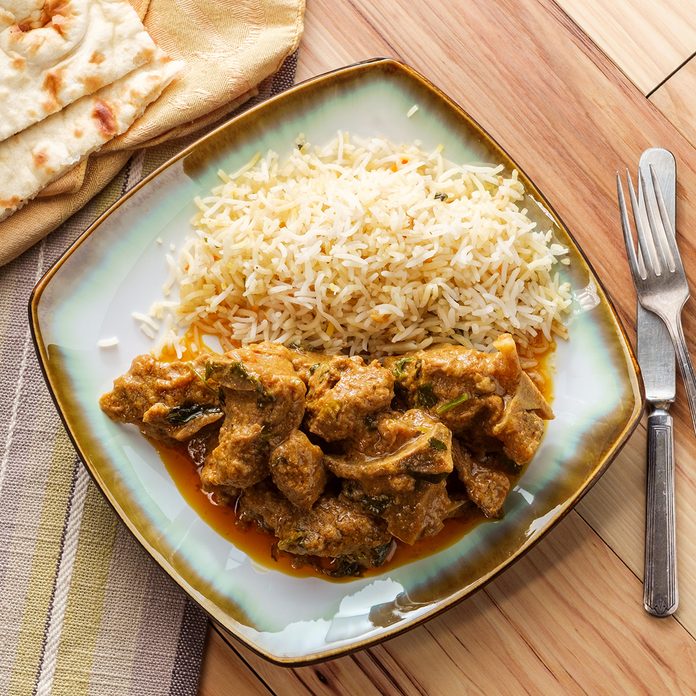 traditional jamaican foods Authentic Indian goat korma curry with jasmine rice