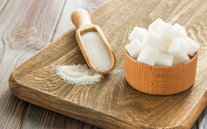 Baking substitutes Close Up Of Sugar In Spoon And Bowl On Cutting Board