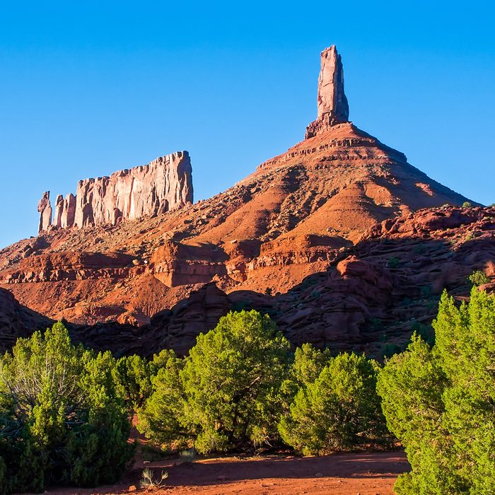 Castleton Tower (Castle Rock) and The Priest and Nuns atop Round Mountain in Utah
