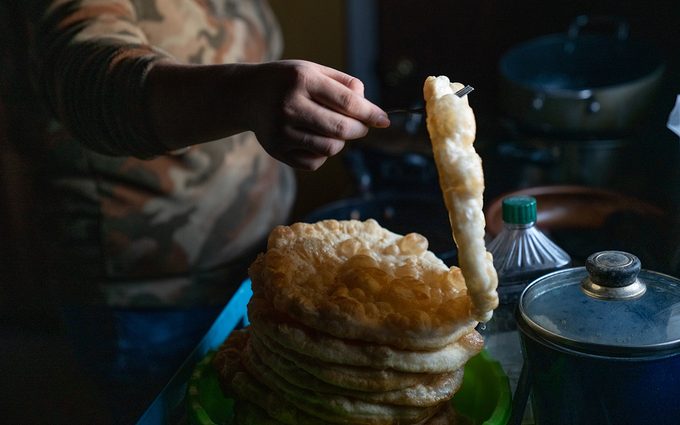 Young Navajo Woman Cooking Fry Bread For Navajo Tacos