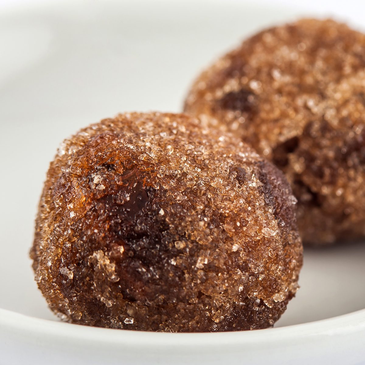 Tamarind Balls A Traditional Sweet From Cartagena De Indias  On White Ceramic Dish