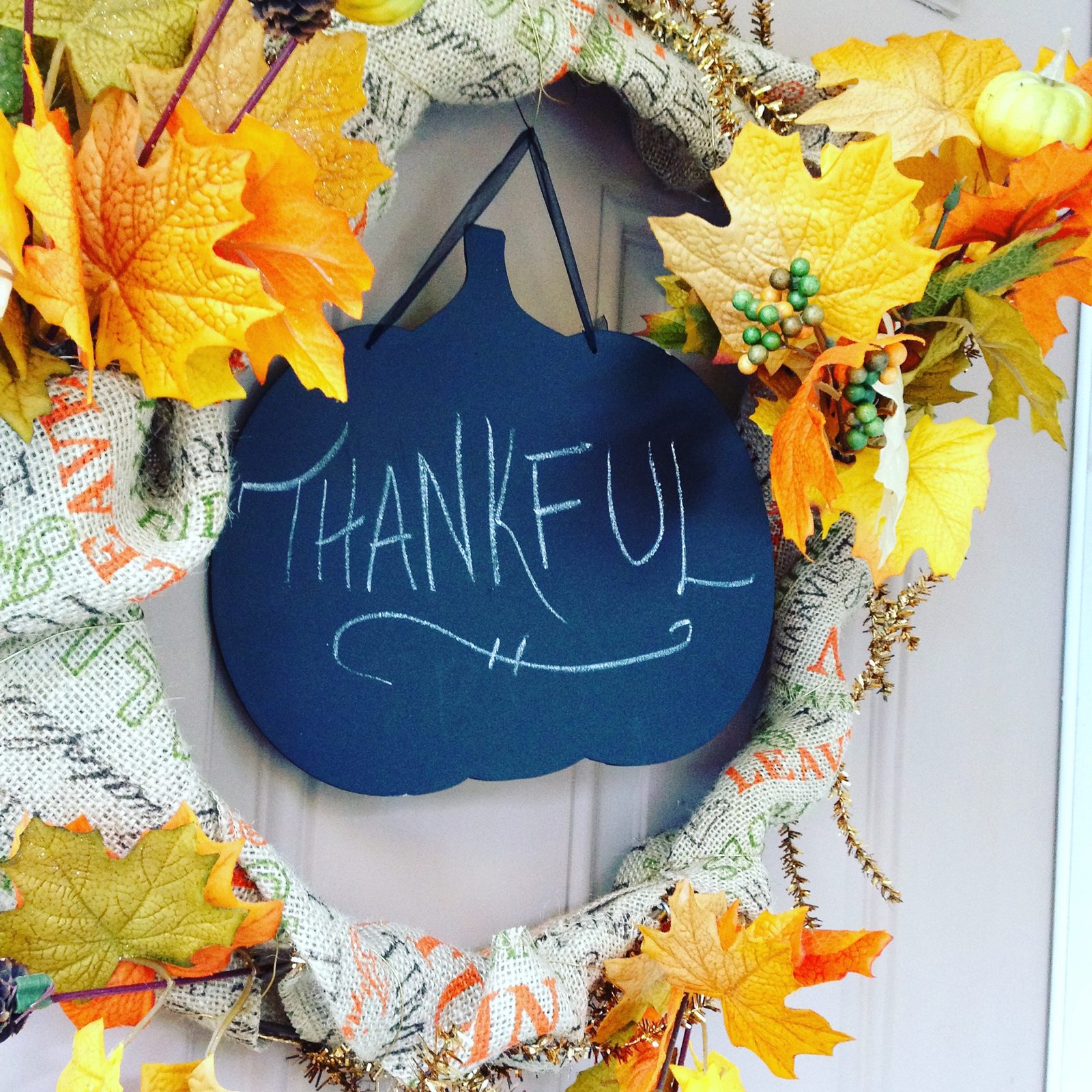 fall chalkboard wreath with faux leaves and burlap wrap