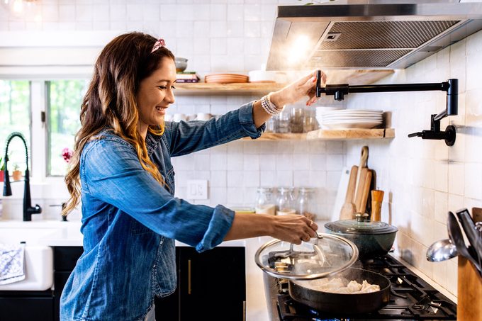 Peloton instuctor Emma Lovewell cooking dumplings in her kitchen
