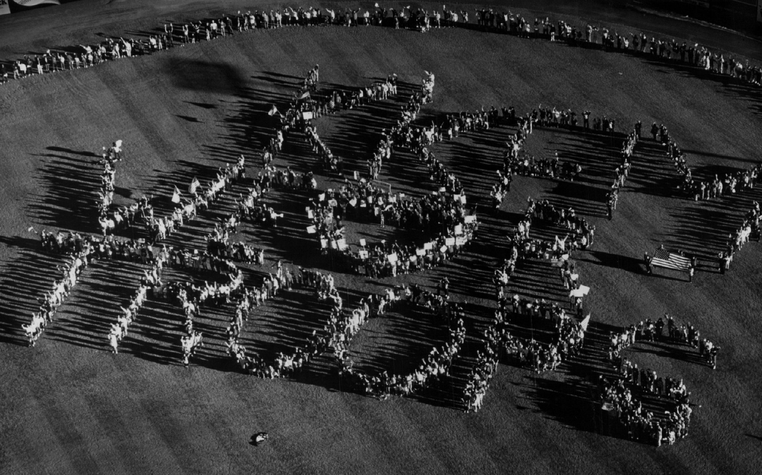 FEB 11 1991 Persian Gulf War - Colorado Thousands of persons gathered Sunday afternoon in the outfield of the sky sox Stadium in Colorado Springs to send a human valentine to the U.S. troops stationed in the Persian Gulf. Credit: Denver Post (Denver Post via Getty Images)