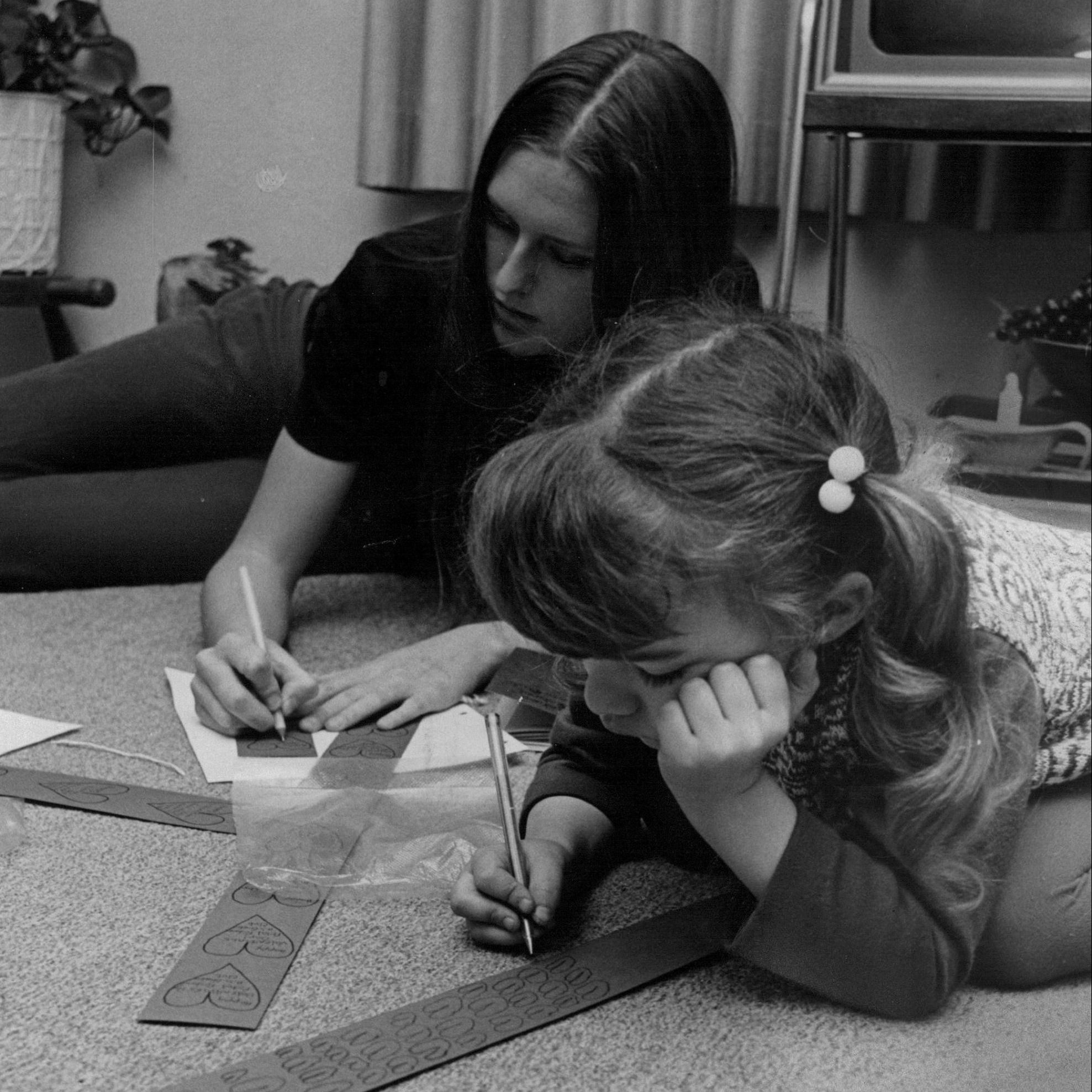 Mary Hayes, Arvada West member of the Petal Pushers Garden Club, and Robin Stover, 5-year-old daughter of club