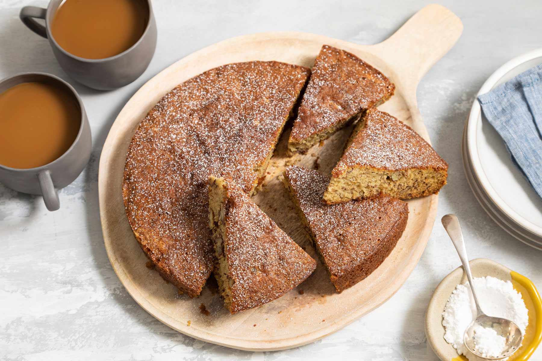 Slices of Air Fryer Banana Bread served in a plate with hot chocolate
