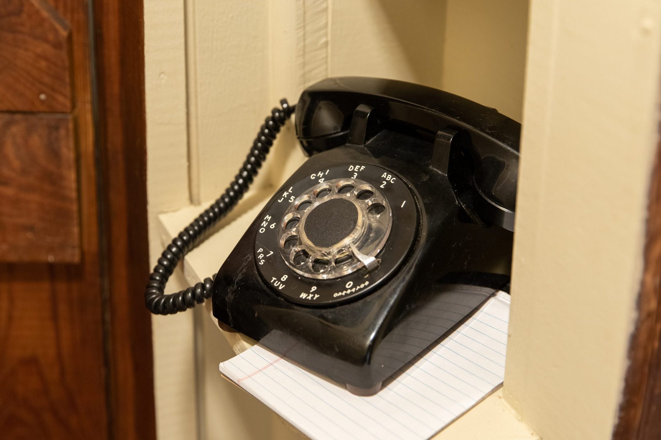 Old Black Rotary Phone Sitting In Hallway Phone Niche Of Old House