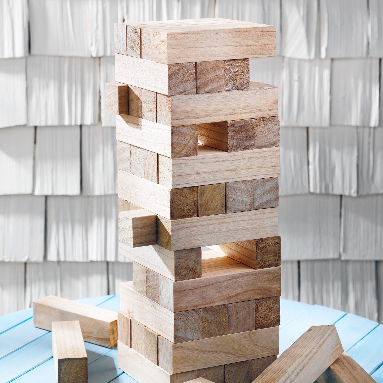 extra large janga game on a table outside for a backyard party