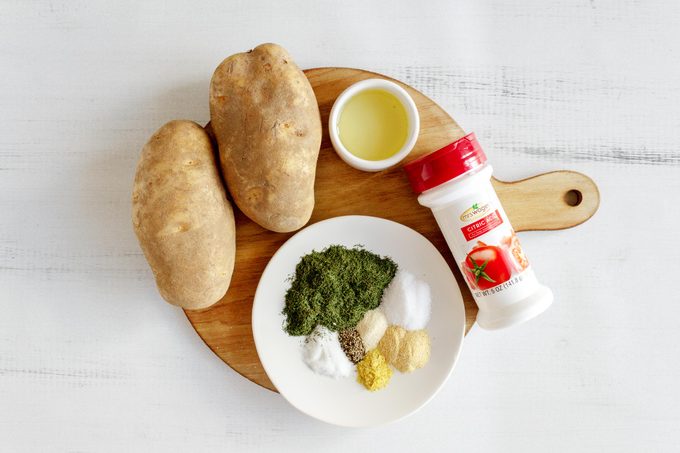 measured out ingredients for dill pickle chips on a cutting board