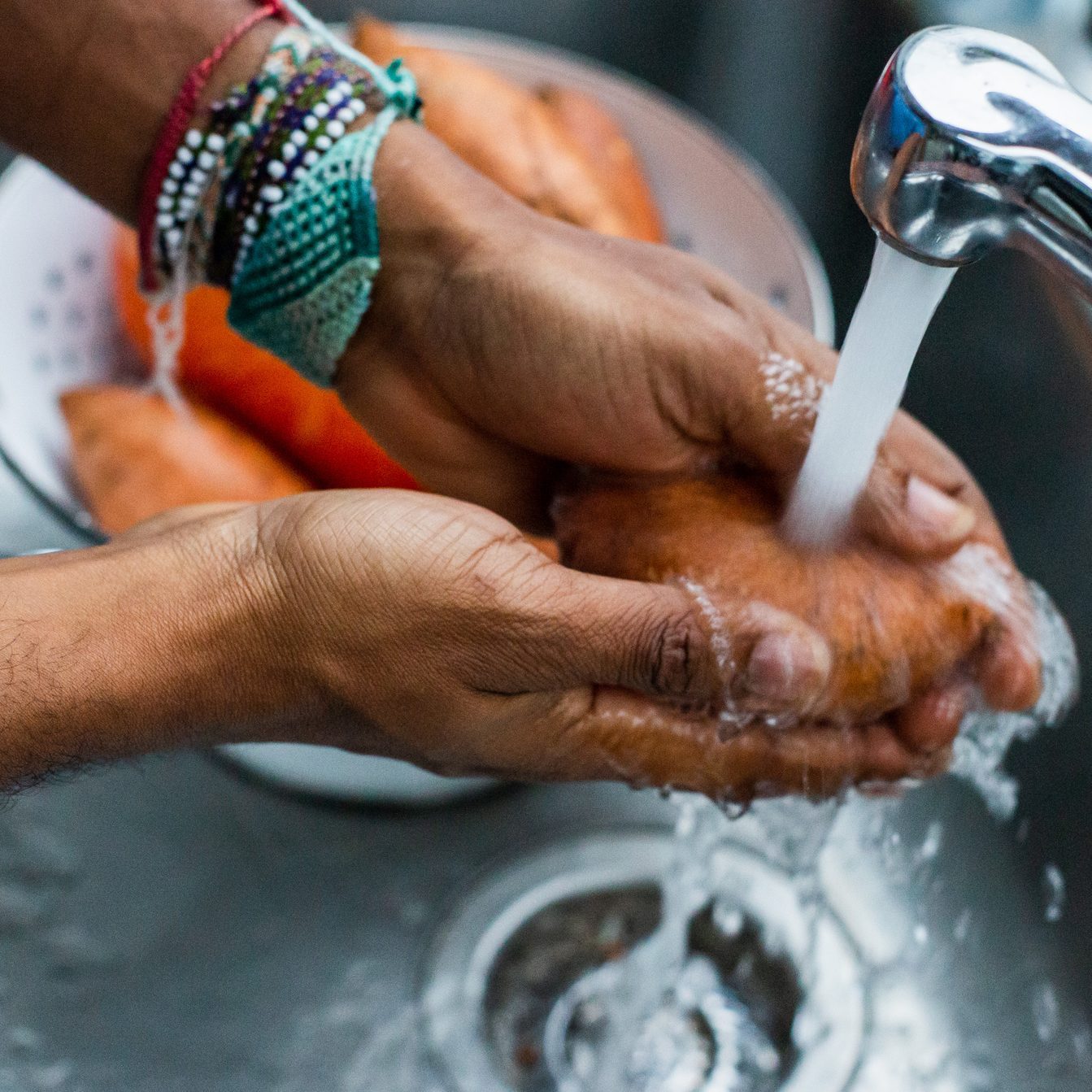 Man Washing Sweet Potato