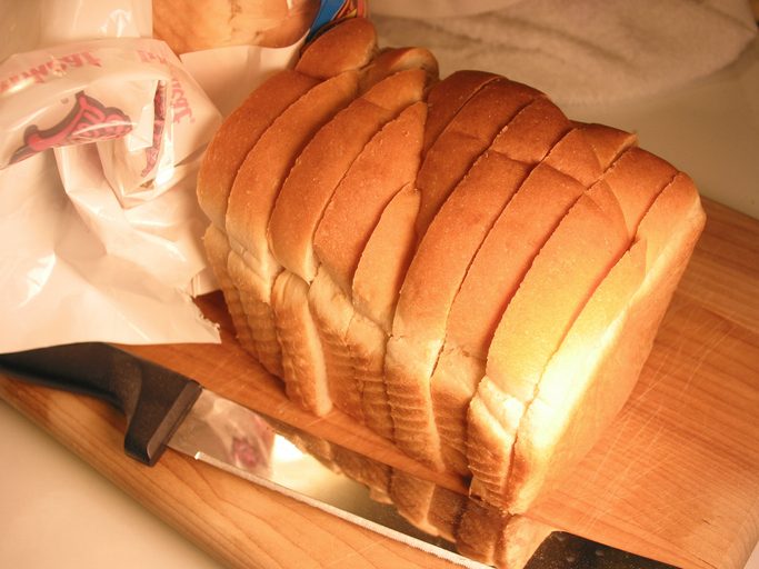 Loaf of bread on cutting board