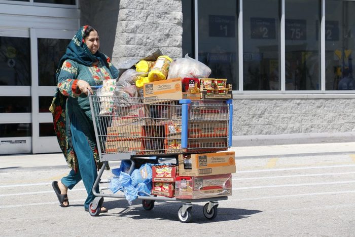 woman leaving grocery store