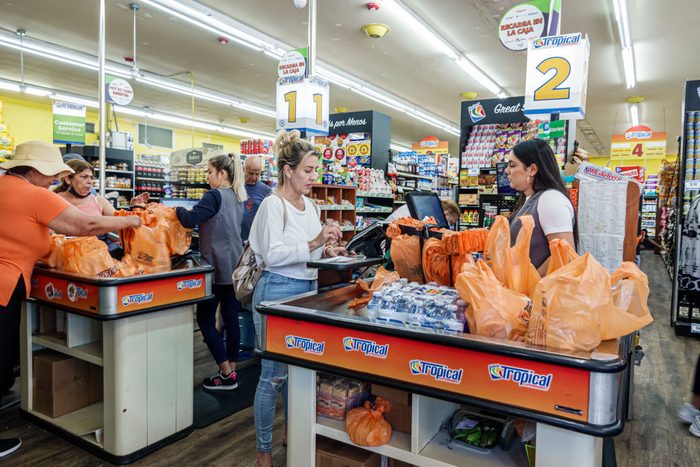 Miami Beach, Florida, Normandy Isle, Sabor Tropical Supermarket, customer checking out checkout cashier line