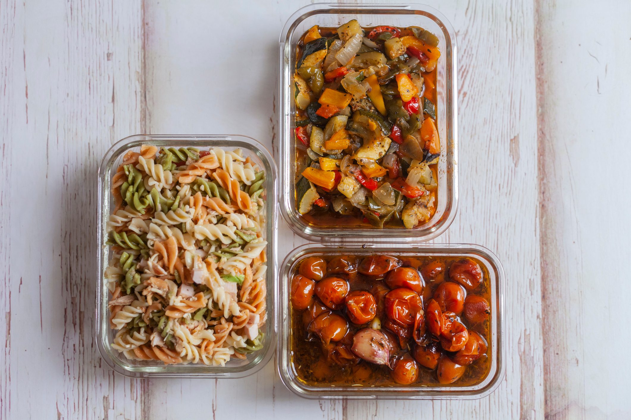 Hermetic glass containers of cooked food. Concept of batch-cooking