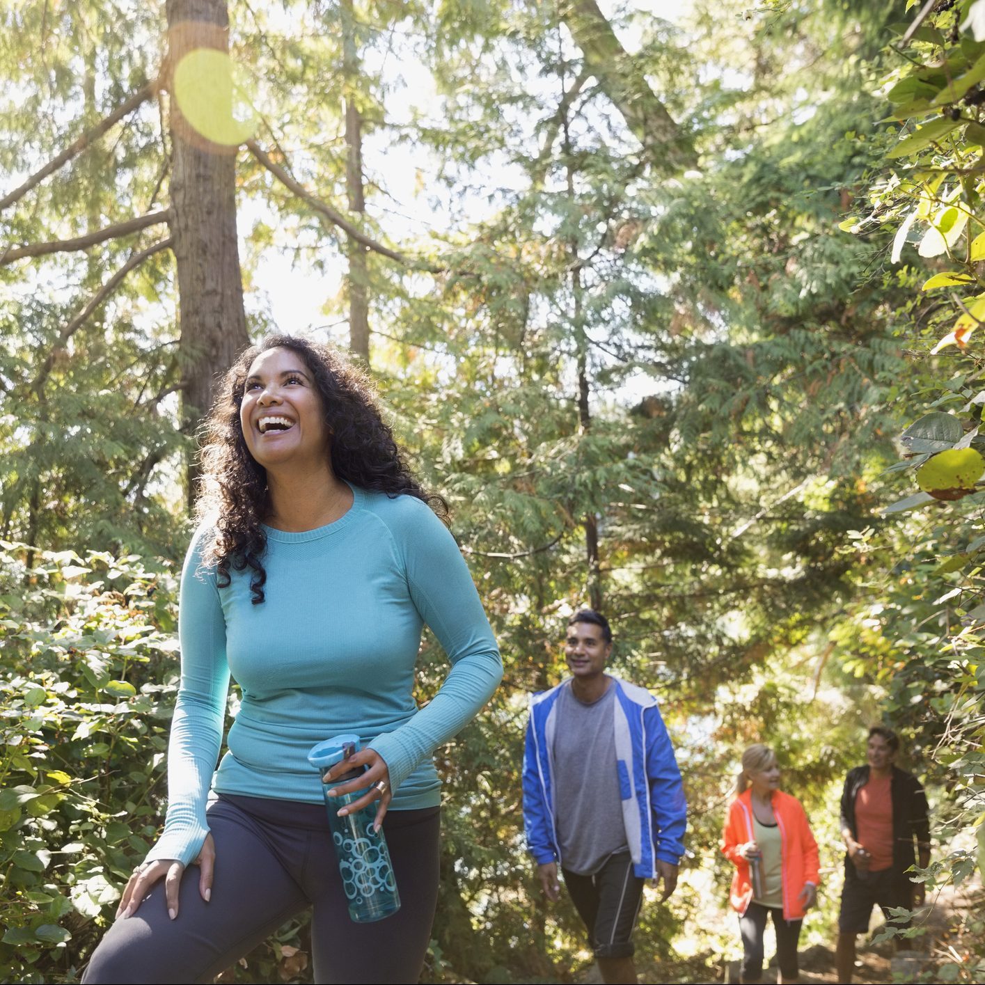 Family hiking in woods