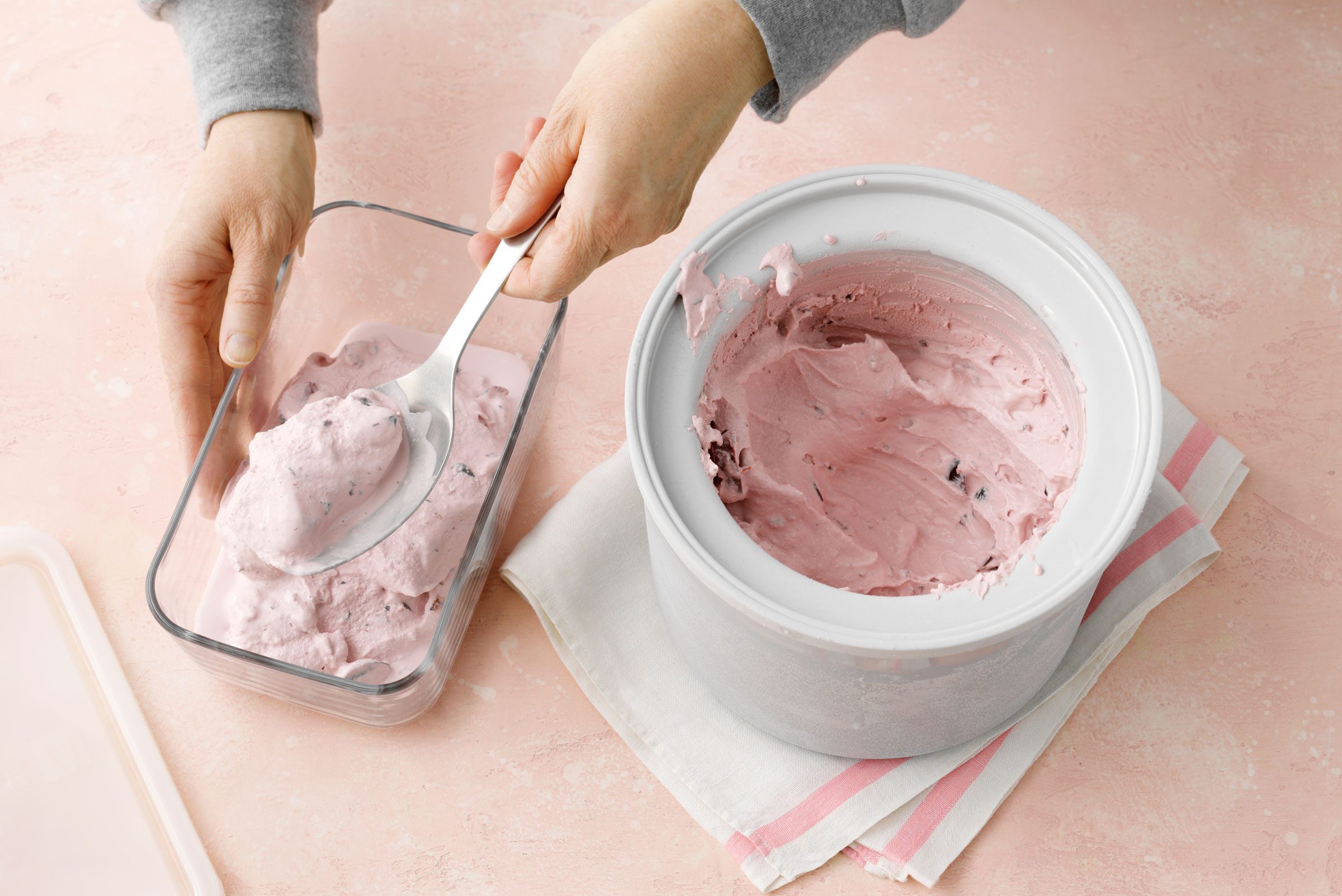 Cherry Ice Cream being scooped from an ice cream maker