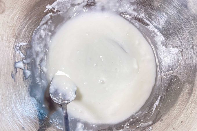 mochi glaze in a metal mixing bowl