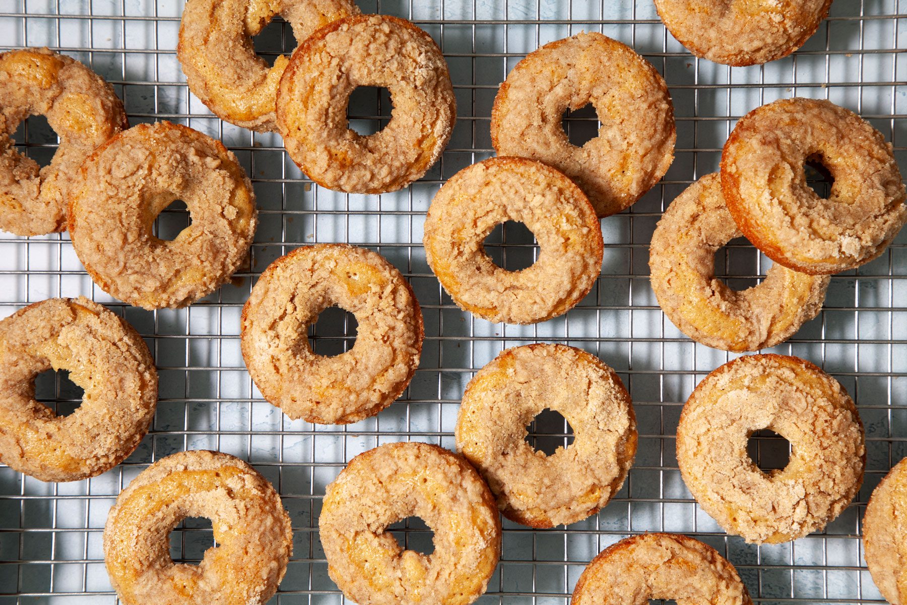 A Group of Donuts on a Cooling Rack