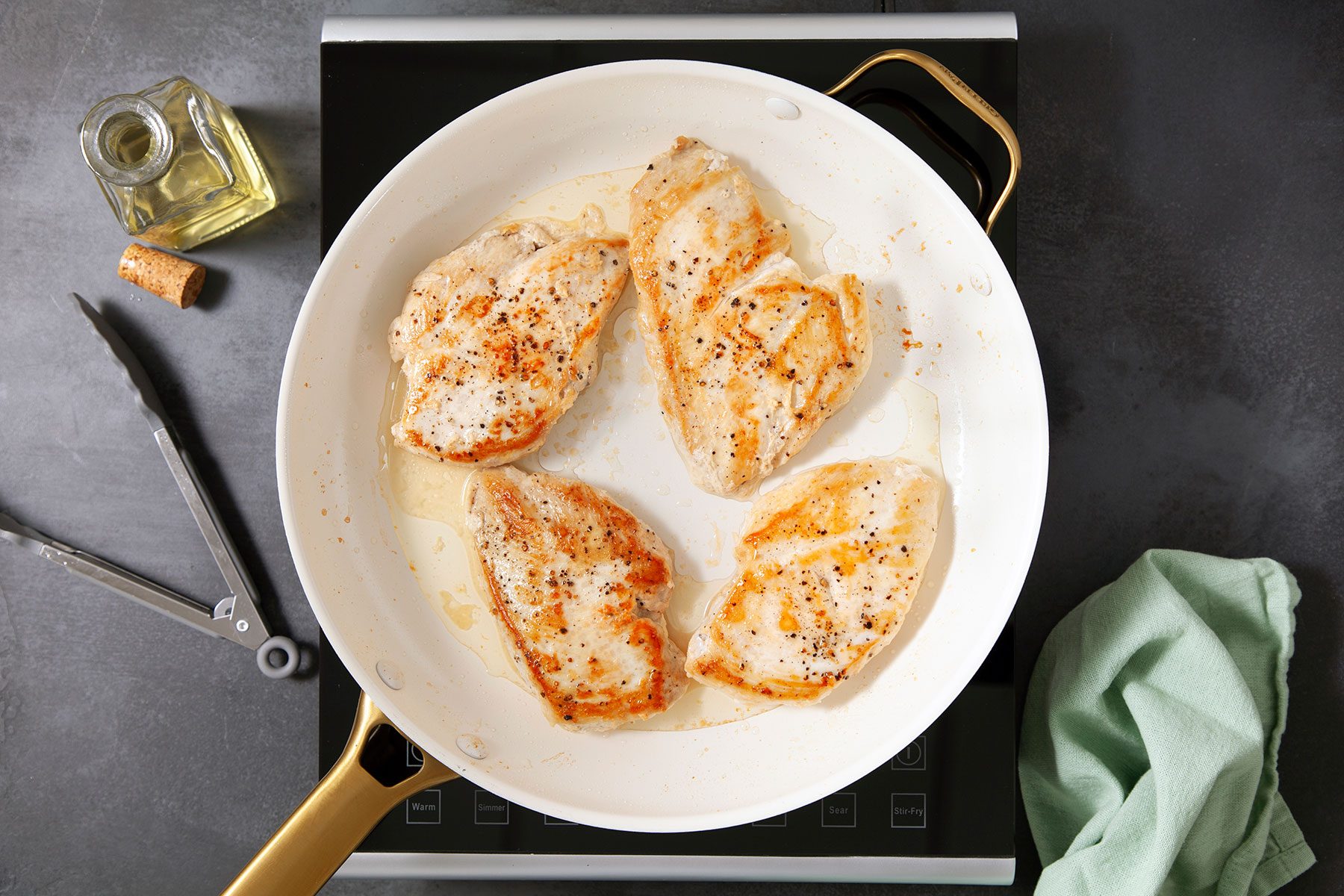 Browning chicken breast in skillet