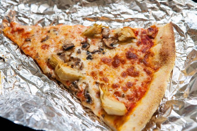 Gettyimages 909240084 Reheat Pizza In Oven On Foil Jvedit2