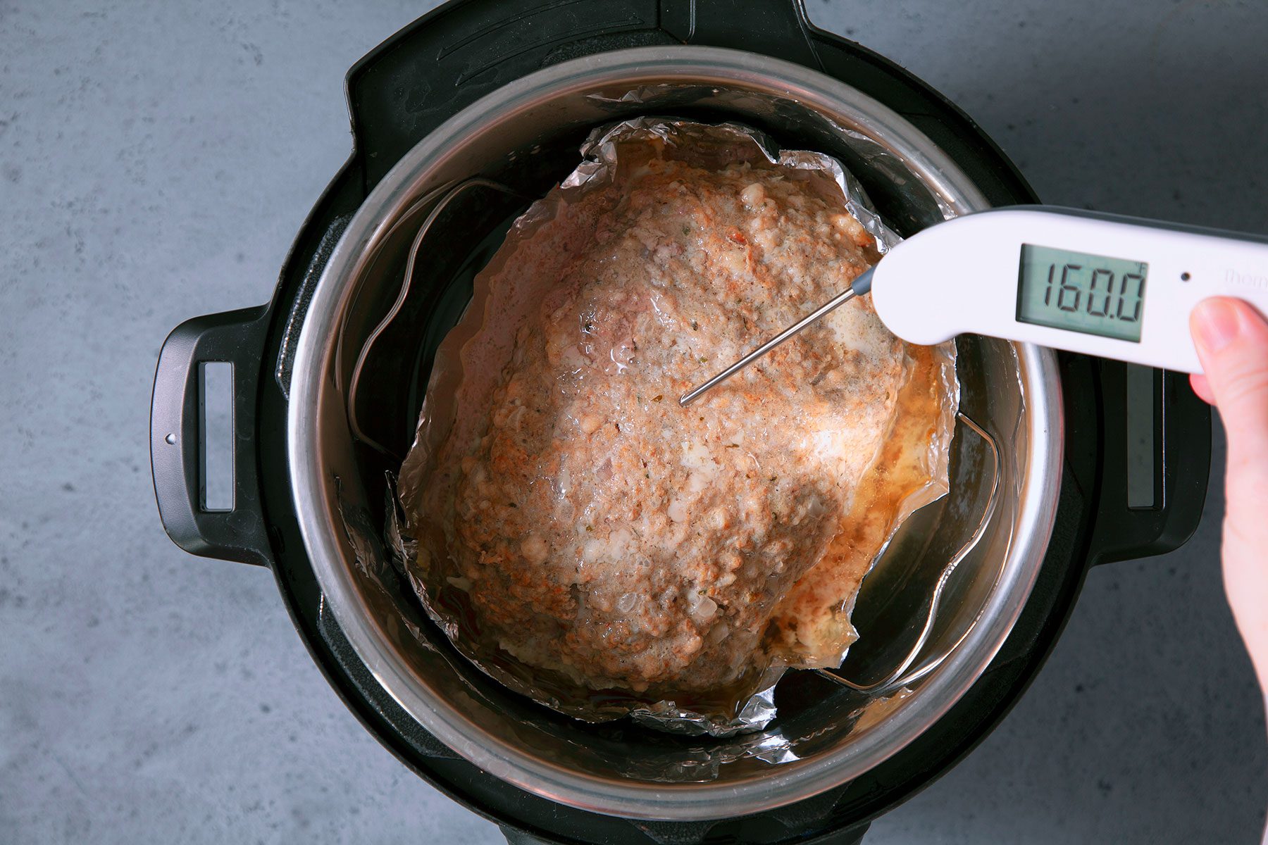 Reading the temperature of Instant Pot Meat Loaf 