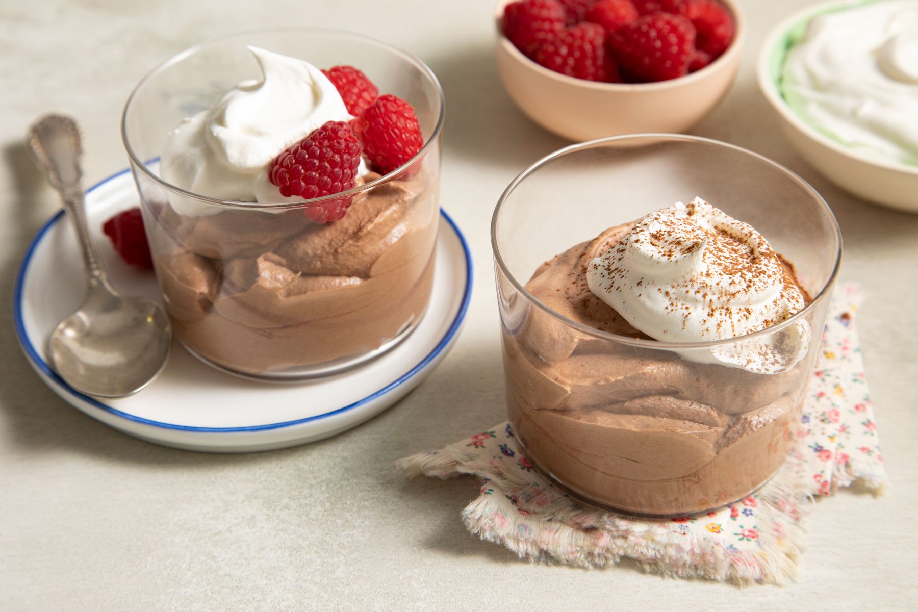 Semisweet Chocolate served in glass with cream and berries