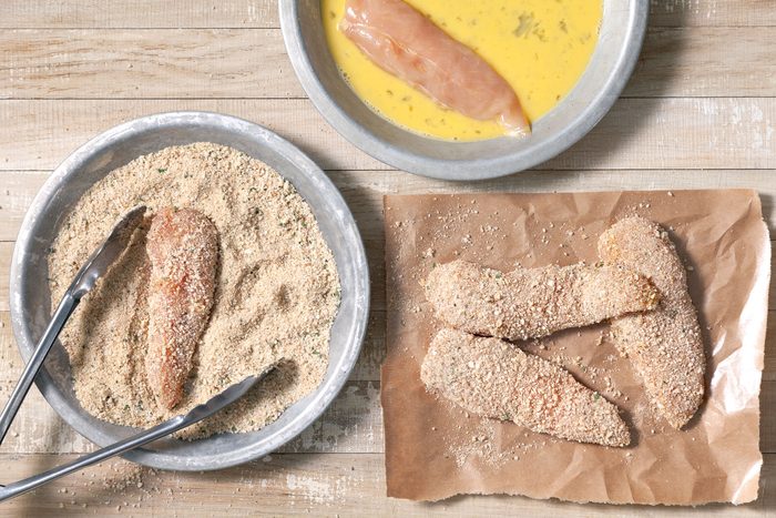 Chicken pieces layered with mixture