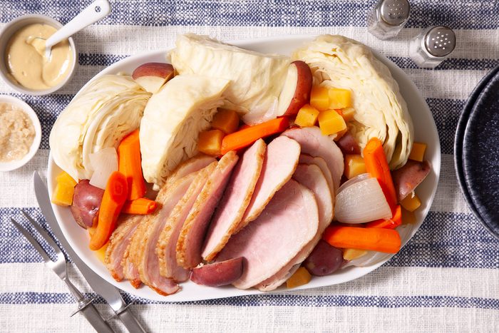 Boiled Ham Dinner served on plate with dip