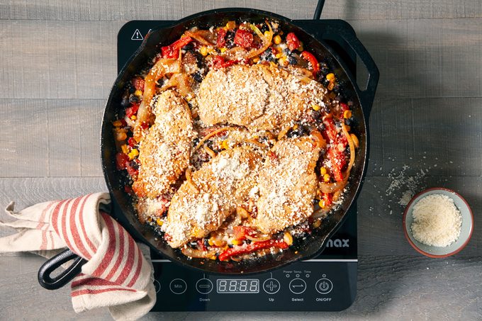 Vegetables and Chicken mixed together with cheese on top