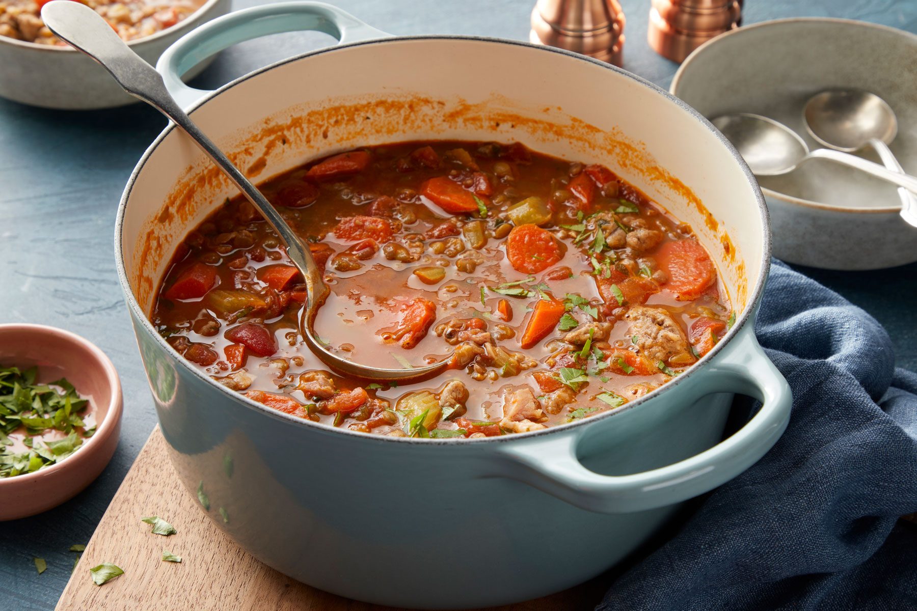 Ham And Lentil Soup served on a table in a large dutch oven