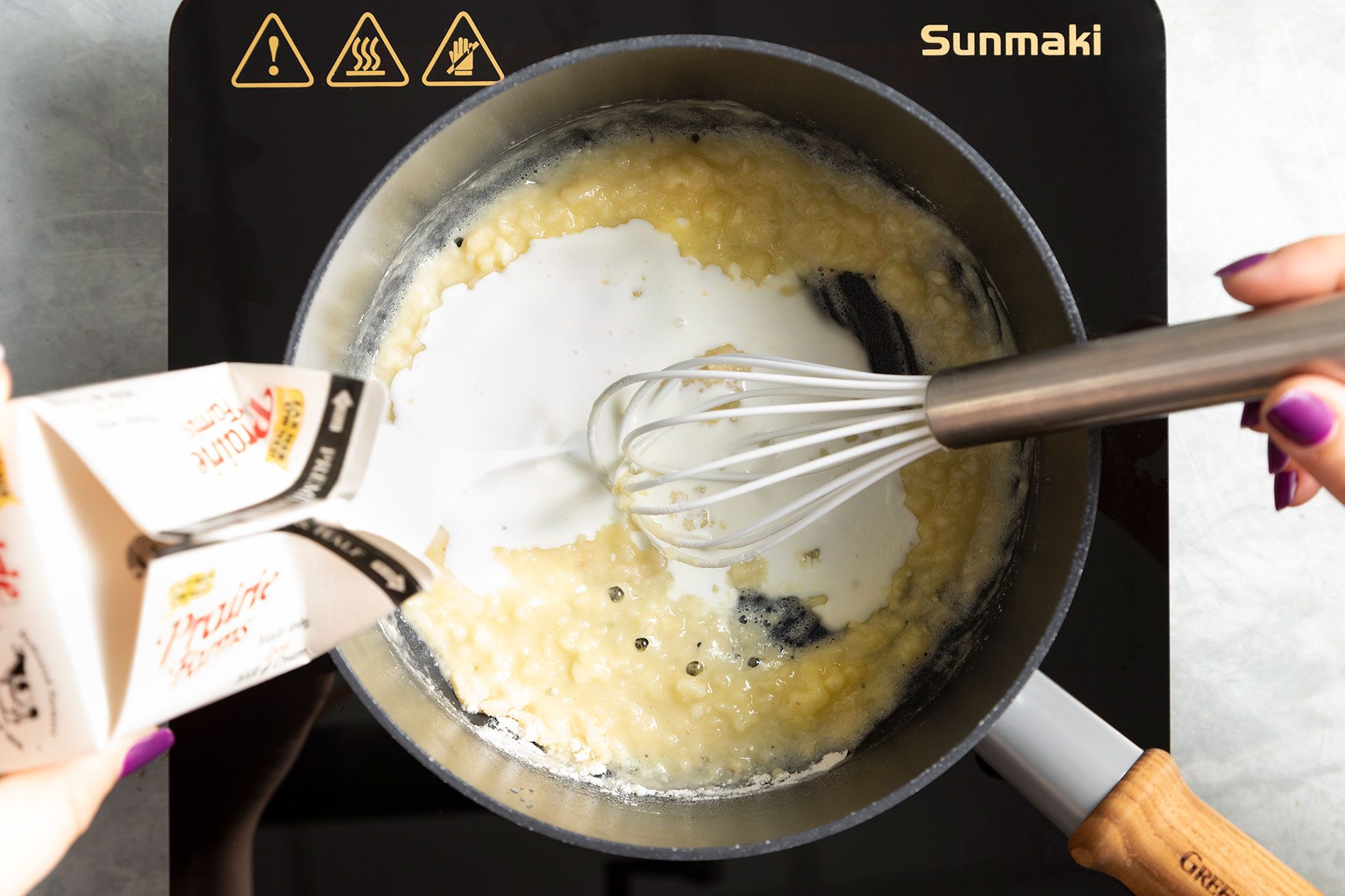 Stirirng Ingredients in sauce pan 