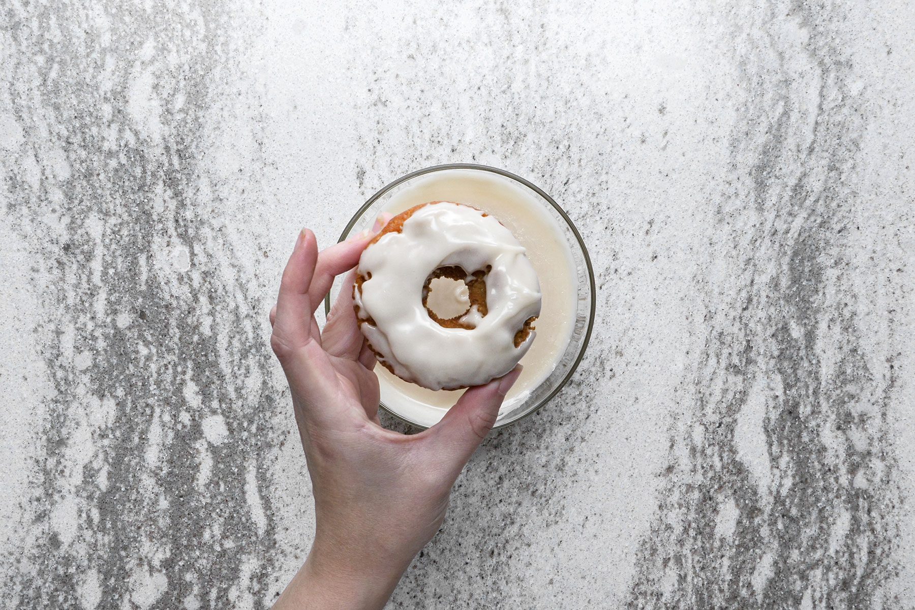 Glazing the doughnuts