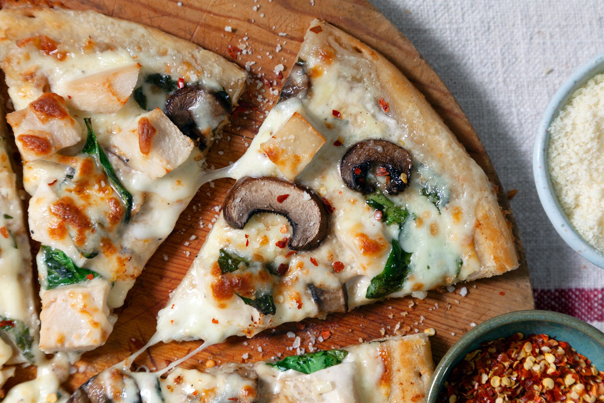 Chicken Alfredo Pizza slices