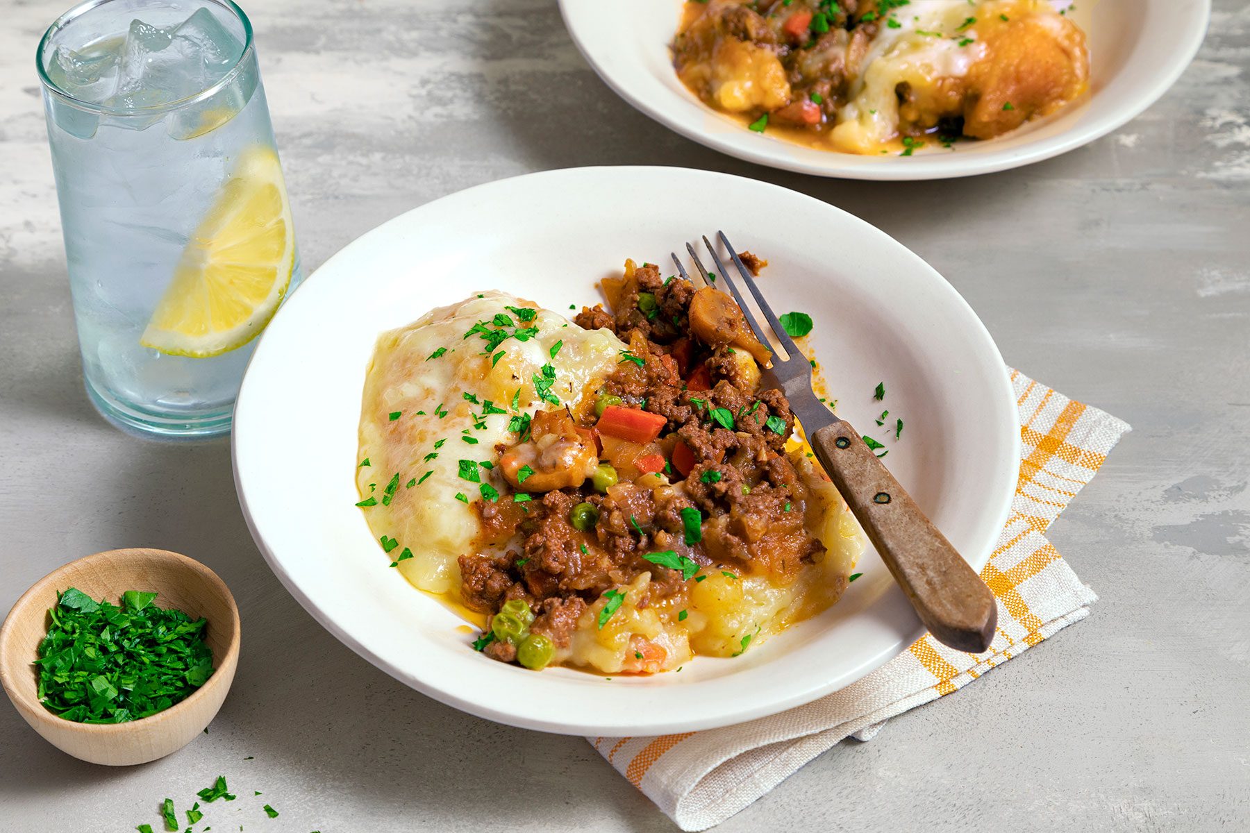 Crockpot Shepherd's Pie garnished with parsley served on plate