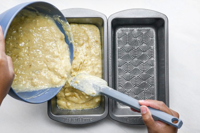 Pouring Gluten-Free Banana Bread Batter into Loaf Pans