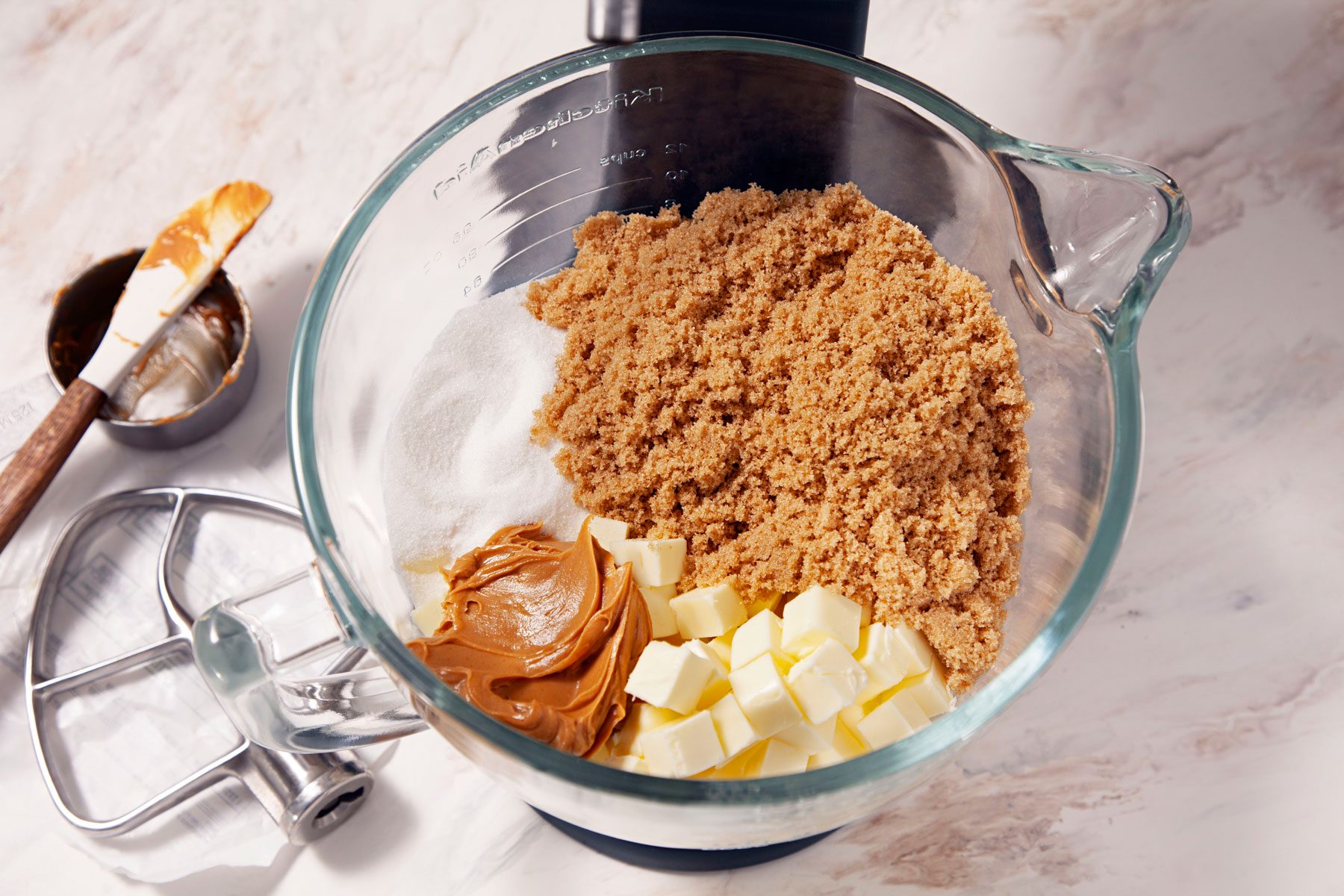 Butter, peanut butter and sugar mixed in a mixer