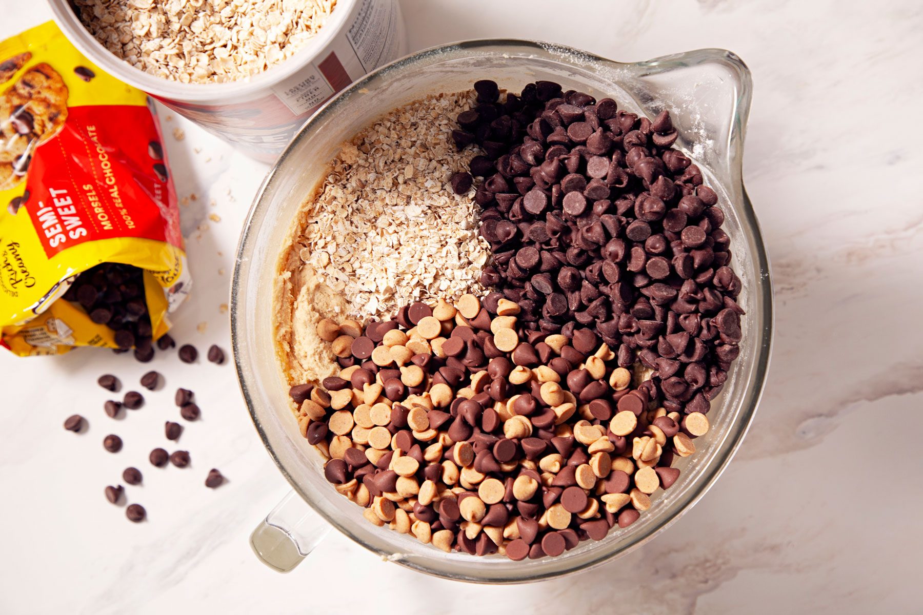 Chocolate chips, peanut butter chips and oats mixed in a blender jar