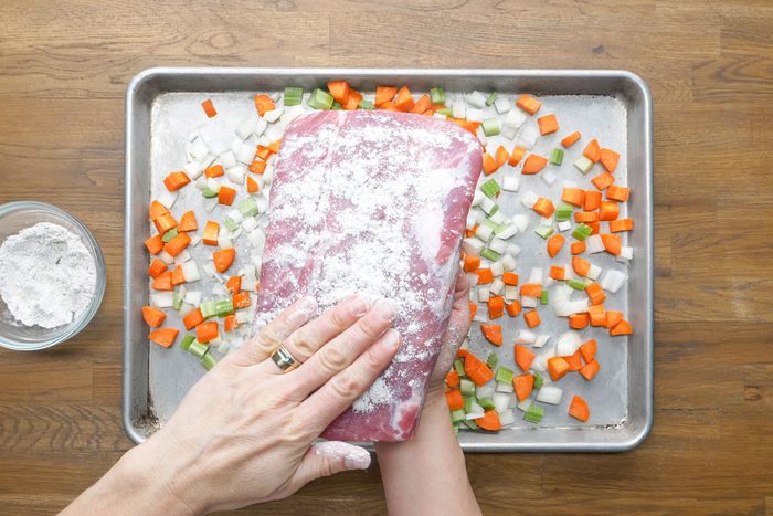Rub the seasoned flour mixture over the roast