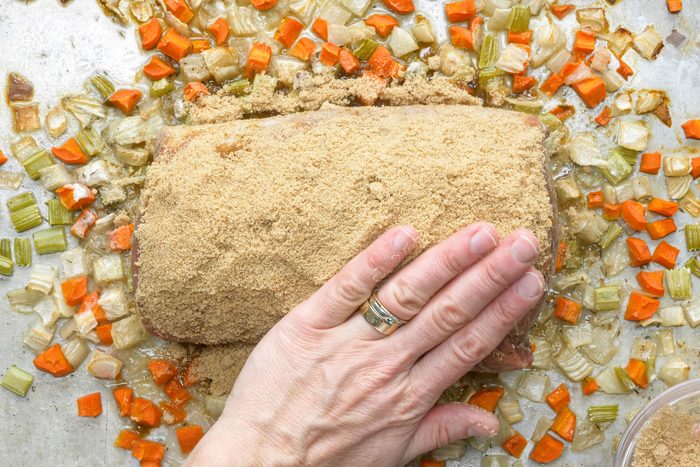 Sprinkle the brown sugar over the top of the roast