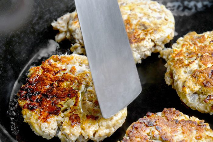 frying Salmon Patties in a cast iron skillet