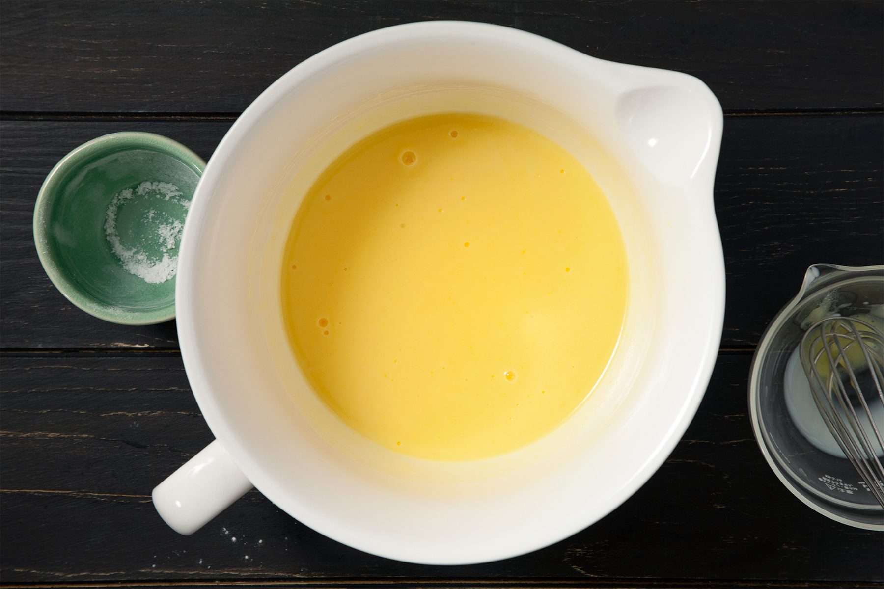 A bowl of milk and pudding mixture